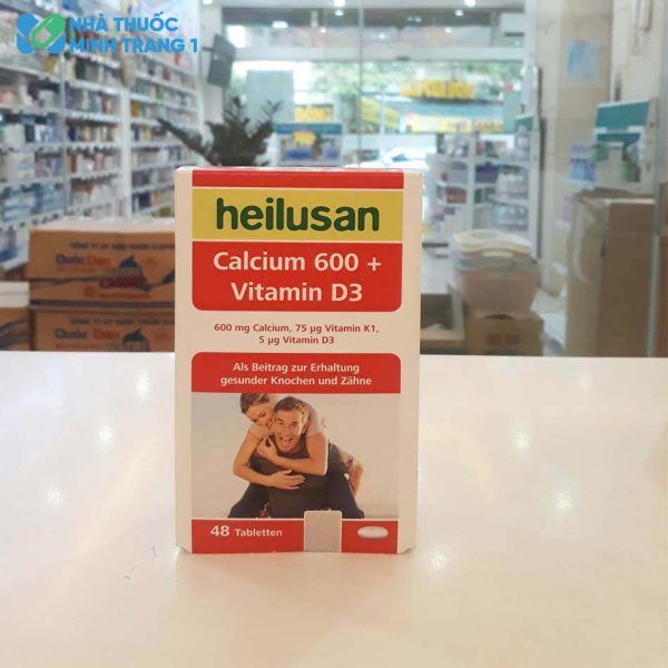 Hình ảnh hộp sản phẩm Thực phẩm bảo vệ sức khỏe Heilusan Calcium 600 + Vitamin D3 được chụp tại nhà thuốc Minh Trang 1
